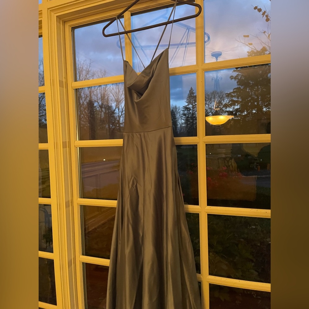 Full length, tie back, silver blue formal satin dress.